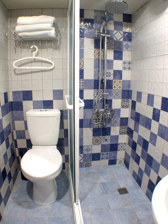 Triple Room with Private Bathroom (1 Double Bed + 1 Single Bed)